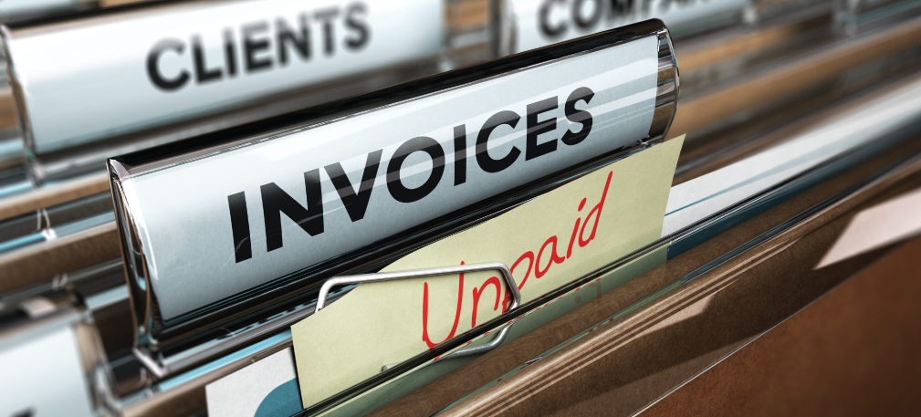 Unpaid invoices in filing cabinet